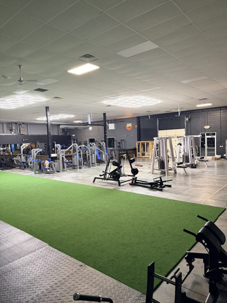 Spacious workout area and indoor turf